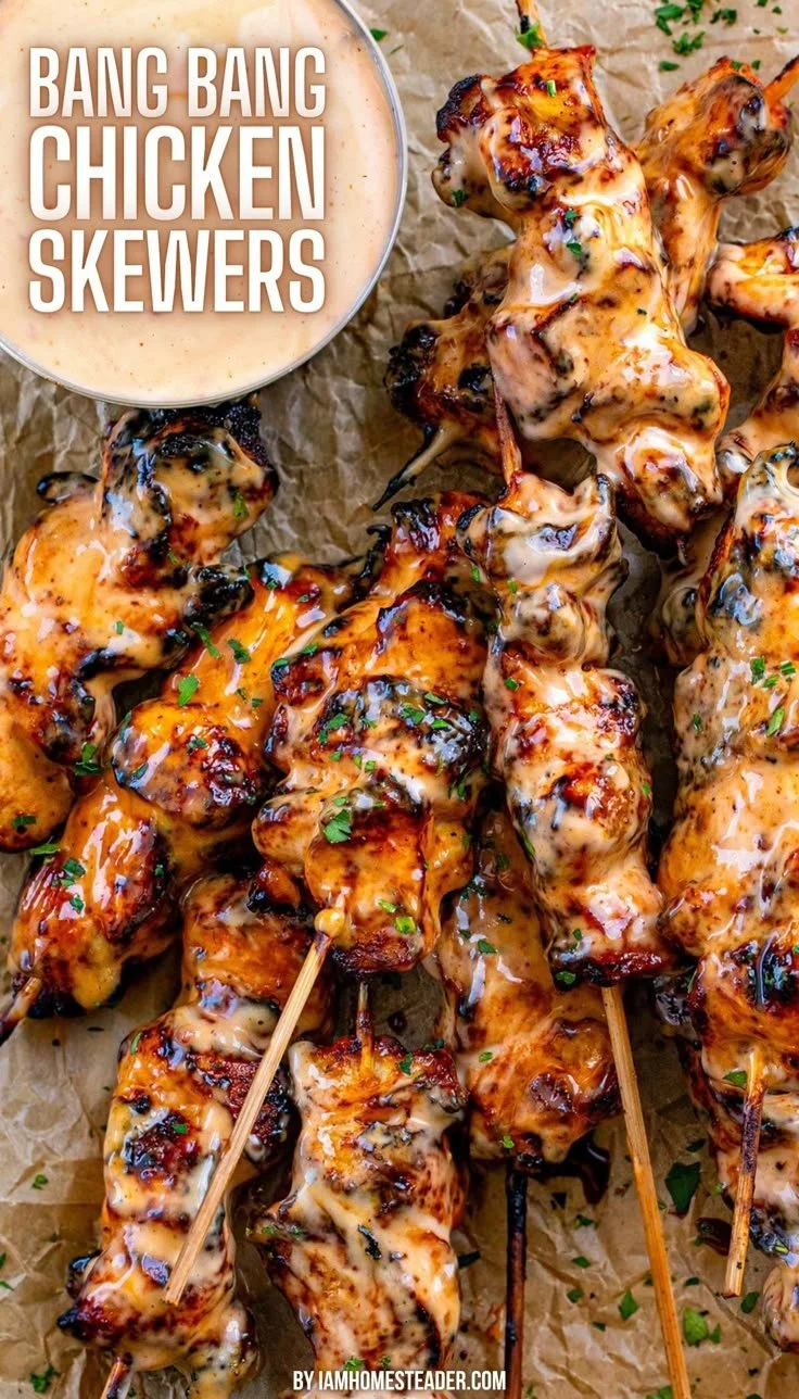 Delicious Bang Bang Chicken Skewers served on a platter