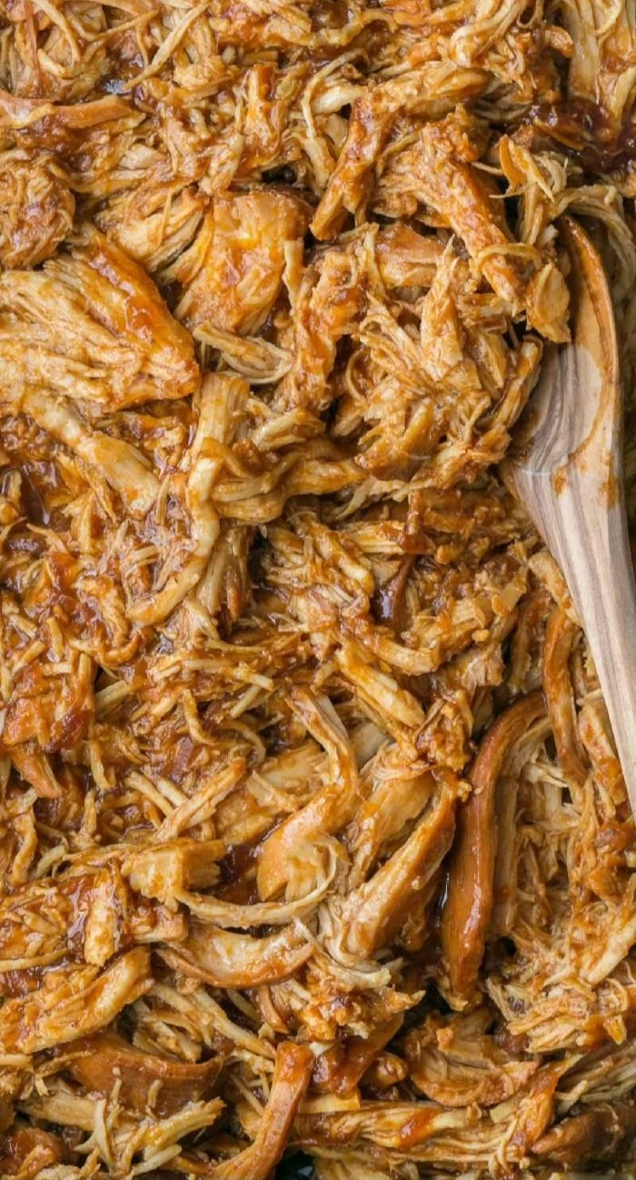 Delicious Crockpot BBQ Chicken served with sides