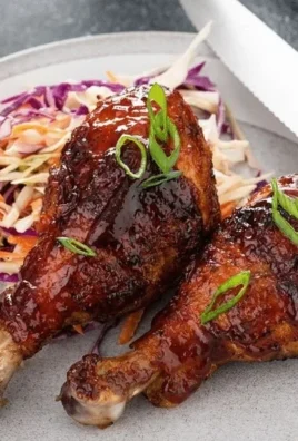 Juicy grilled BBQ chicken legs seasoned and ready to eat