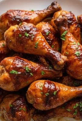 Oven baked BBQ chicken drumsticks glazed with tangy BBQ sauce