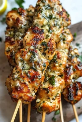 Garlic parmesan chicken skewers ready for summer grilling