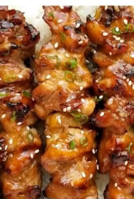 Delicious teriyaki chicken skewers ready to be served.