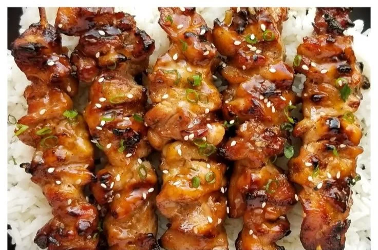 Delicious teriyaki chicken skewers ready to be served.