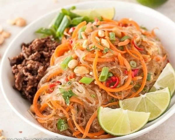 Yam Wun Sen translates to "Spicy Glass Noodle Salad" in English.