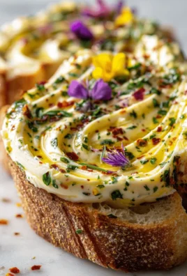 Delicious butter board with assorted toppings and fresh bread for spreading.