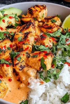 Delicious Coconut Chicken Rice Bowl with chicken, coconut rice, and vibrant toppings.