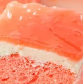 Delicious Hawaiian Guava Cake topped with fresh guava slices and whipped cream