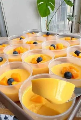 Delicious no-bake mango panna cotta dessert served in elegant glasses