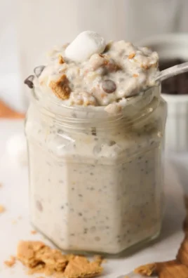 Delicious bowl of S'mores Overnight Oats topped with marshmallows and chocolate