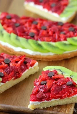 Strawberry Kiwi Fruit Pizza served on Watermelon with vibrant toppings