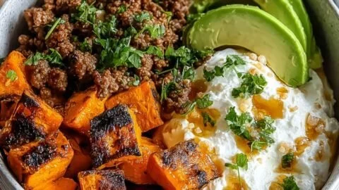 Viral ground beef hot honey bowl with colorful vegetables and a sweet glaze