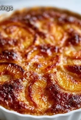 Classic peach cobbler dessert with juicy peaches and a golden crust