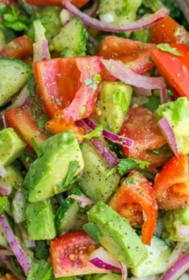 Cucumber Tomato Avocado Salad with fresh ingredients in a bowl