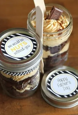 Delicious chocolate peanut butter brownie dessert layered in a jar