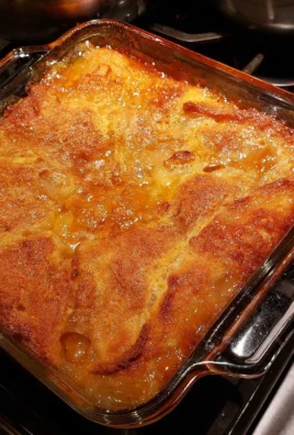 Deliciously baked easy peach cobbler topped with golden crust