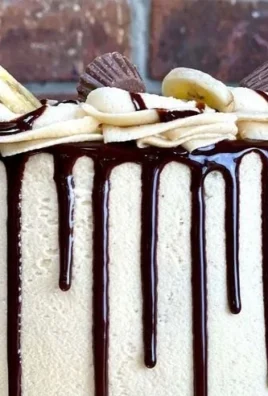Delicious Father's Day banana cake with icing and decorative toppings