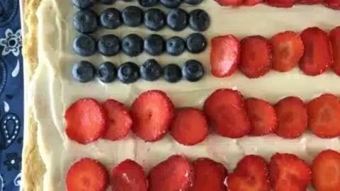 Flag Fruit Sugar Cookie Pizza topped with vibrant fresh fruits