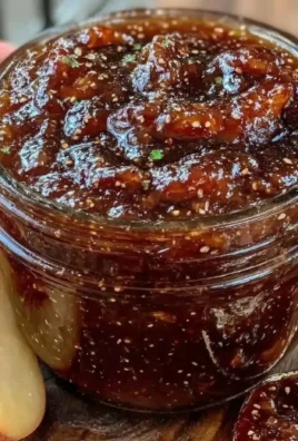 Homemade Peach Bourbon BBQ Sauce in a jar, ideal for grilling and canning.