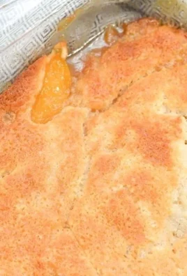 Delicious Georgia Peach Cobbler dessert with fresh peaches and golden crust