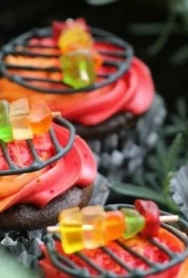 Delicious grill cupcakes served on a platter, decorated with colorful frosting.