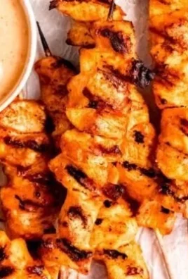 Grilled Bang Bang Chicken Skewers ready for serving