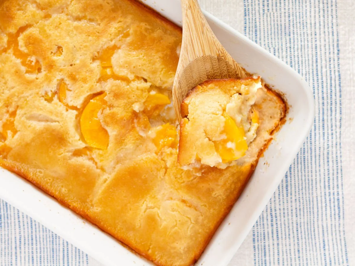 Delicious homemade peach cobbler with golden crust and juicy peaches