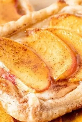 Mini Peach and Cream Cheese Tarts on a white plate