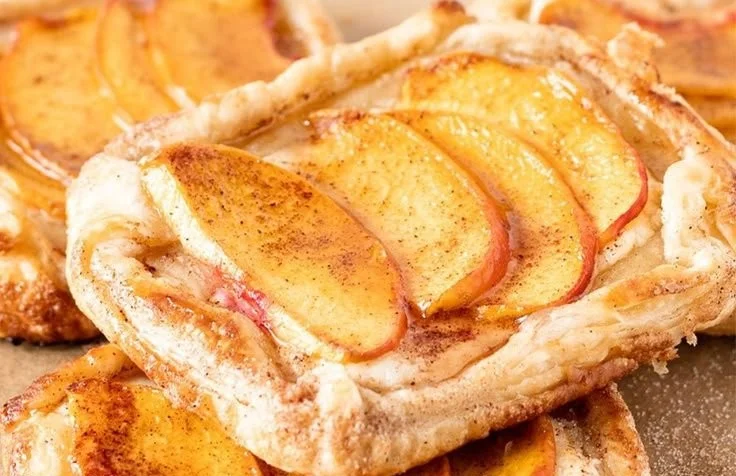 Mini Peach and Cream Cheese Tarts on a white plate