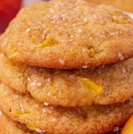 Freshly baked peach cookies arranged on a plate