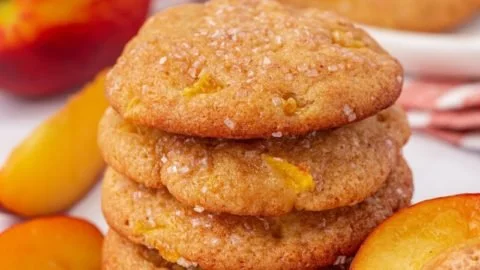 Freshly baked peach cookies arranged on a plate