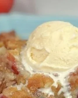 Quick and easy homemade peach cobbler dessert in a baking dish