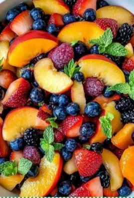 Delicious summer peach fruit salad with juicy peaches and vibrant fruits.
