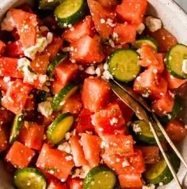 Delicious watermelon salad with honey lime dressing served in a bowl