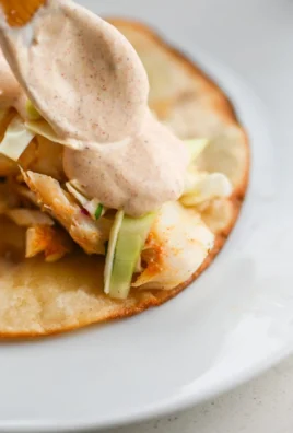 Creamy taco sauce in a bowl with fresh ingredients