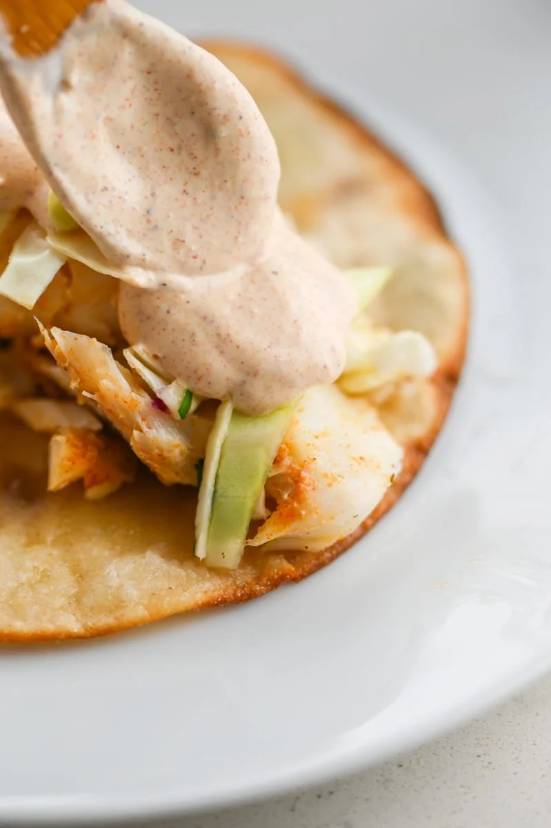 Creamy taco sauce in a bowl with fresh ingredients