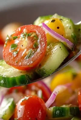 Fresh Cucumber Tomato Salad with herbs in a bowl
