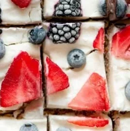 Frozen yogurt granola bars topped with fruits and nuts, a healthy snack option