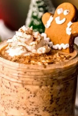Bowl of high-protein gingerbread overnight oats topped with spices and nuts