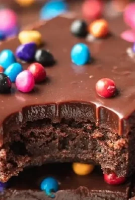 Delicious homemade cosmic brownies topped with chocolate and colorful sprinkles.