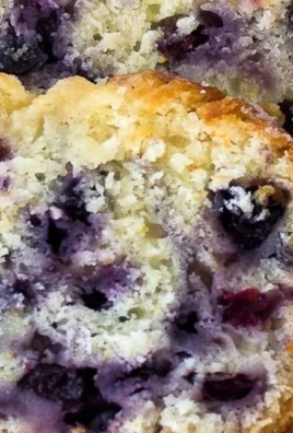 Delicious homemade Lemon Blueberry Loaf with blueberries and lemon zest