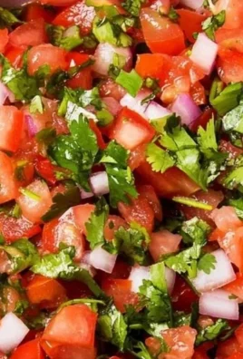 Bowl of Mild Pico de Gallo with fresh tomatoes, onions, and cilantro