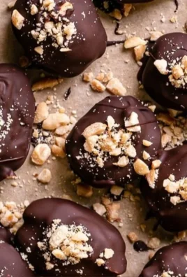 Snickers frozen yogurt chocolate covered date bites on a plate