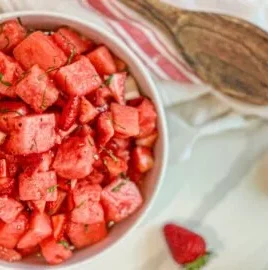 Strawberry Watermelon Salad with honey-lime vinaigrette in a bowl