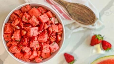 Strawberry Watermelon Salad with honey-lime vinaigrette in a bowl