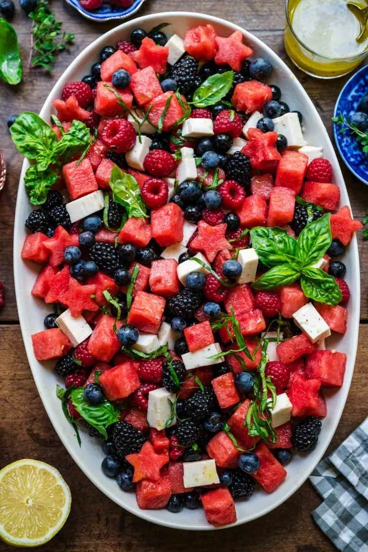 Colorful watermelon blueberry salad with fresh mint leaves